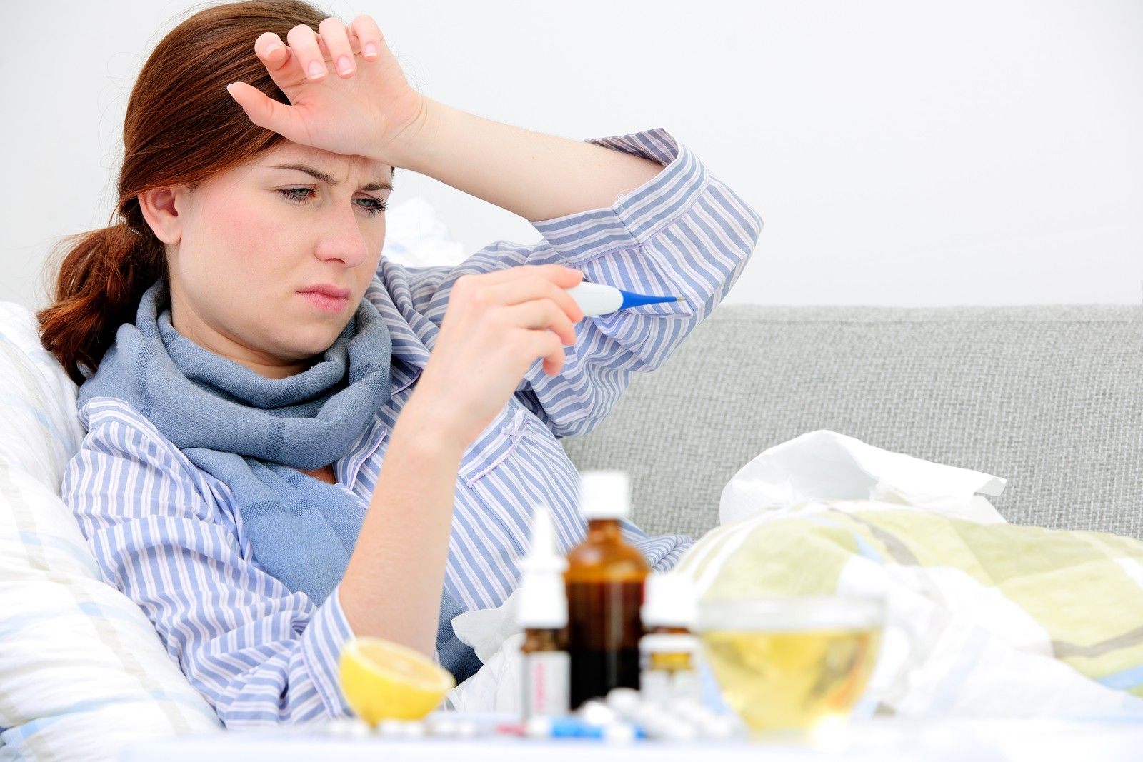 bigstock-sick-woman-lying-in-bed-with-74596954-1.jpg