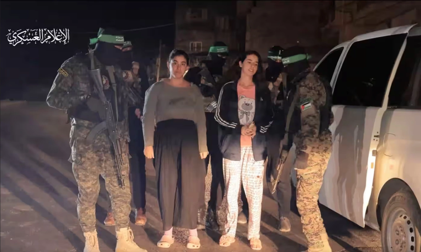 hostages-with-hamas-gunmen-at-an-unknown-location-in-the-gaza-strip-on-nov-30th-2023-reuters-1701394431626.webp