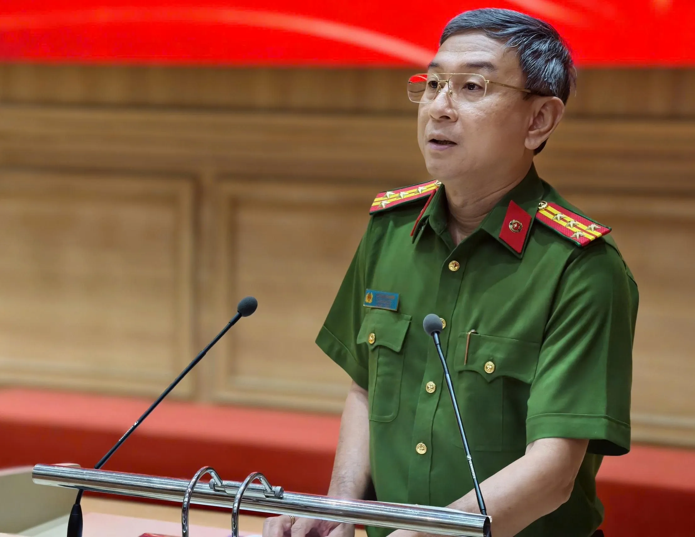 Đại tá Trần Hồng Minh - Phó giám đốc Công an TP.HCM phát biểu tại buổi lễ - Ảnh: Đ.T.