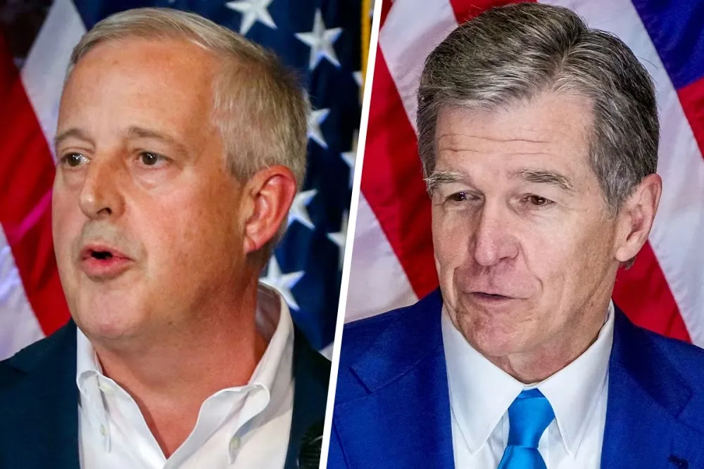 Ứng viên Michael Whatley của đảng Cộng hòa (trái) và Roy Cooper của đảng Dân chủ.