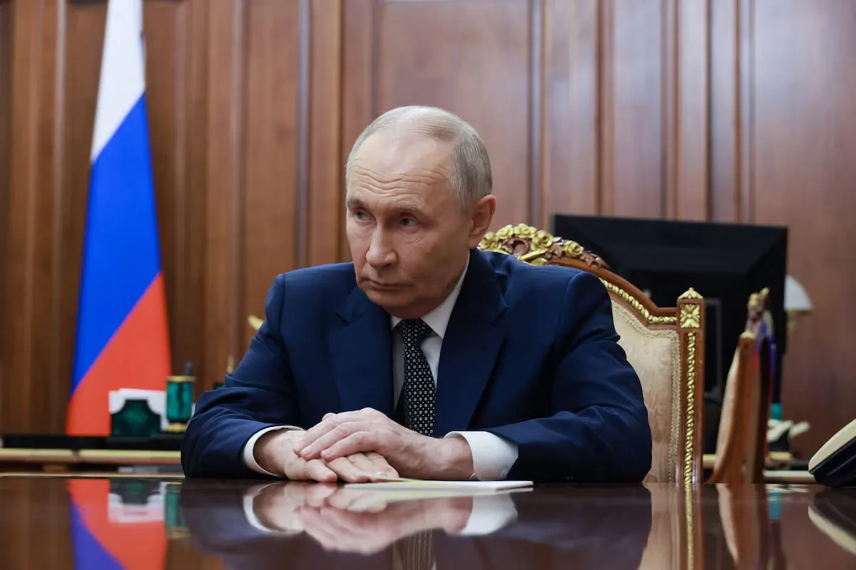 Tổng thống Nga Vladimir Putin tham dự một cuộc họp tại Điện Kremlin ở Matxcơva, ngày 23-12-2025 - Ảnh: REUTERS