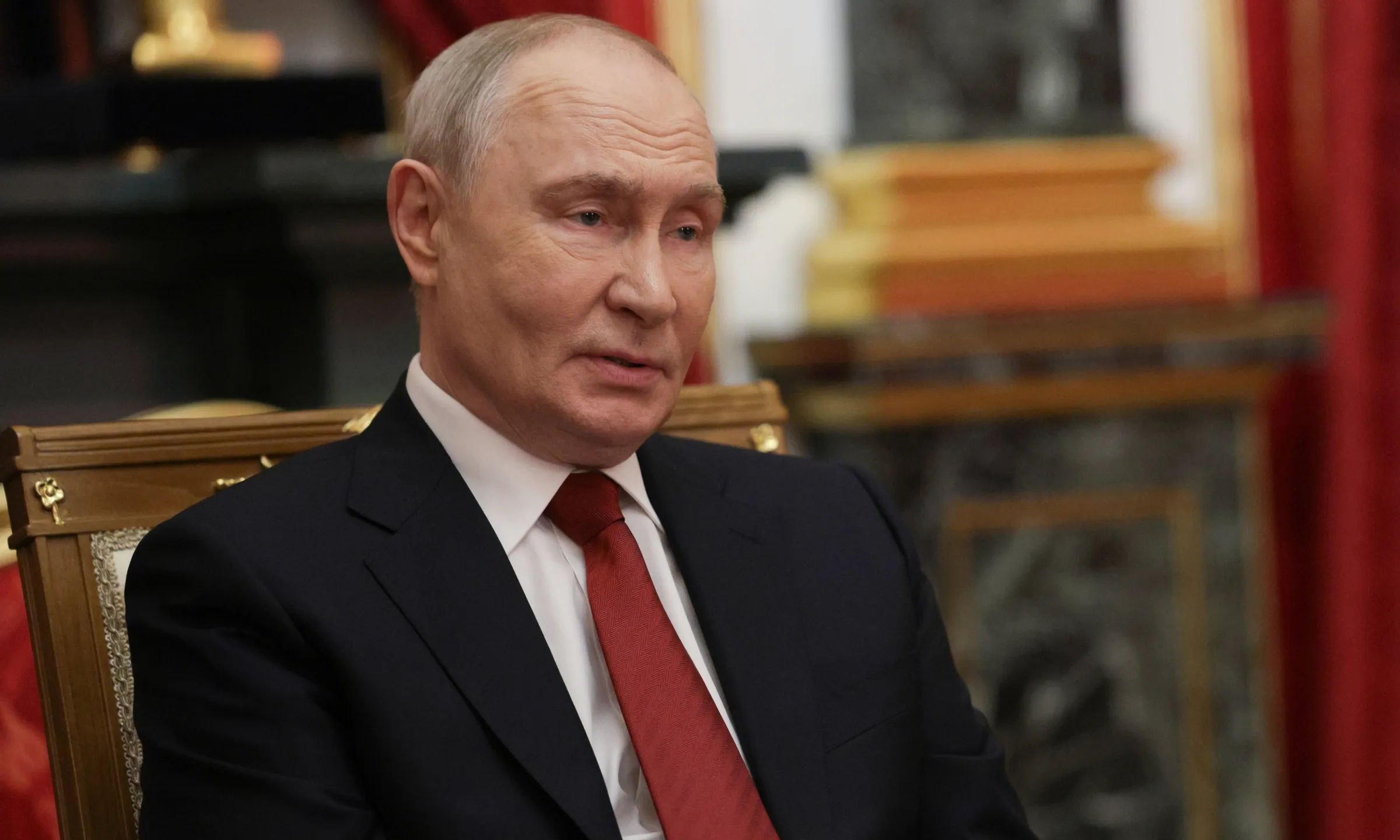 Tổng thống Nga Vladimir Putin trong cuộc gặp hai đặc phái viên Mỹ ngày 5/9 ở Moskva.
