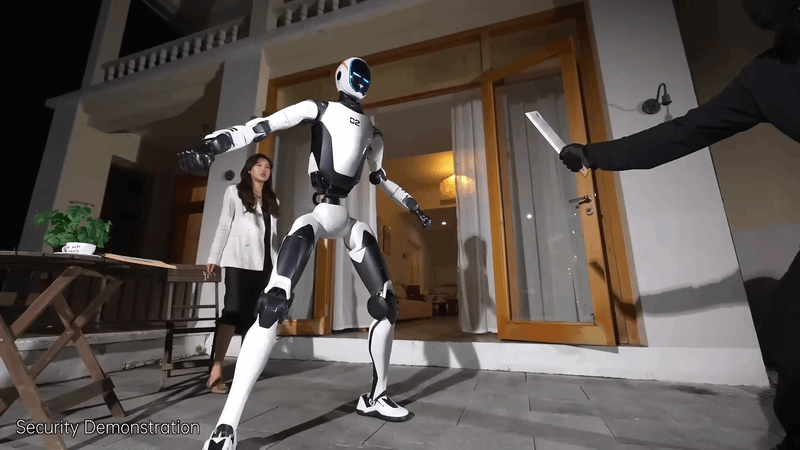Robot khống chế kẻ cầm dao tấn công - Ảnh: UNITREE ROBOTICS