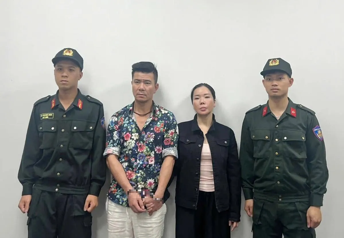 Vợ chồng bị can Nguyễn Thị Mai Anh và Lê Văn Đông tại cơ quan điều tra - Ảnh: CACC