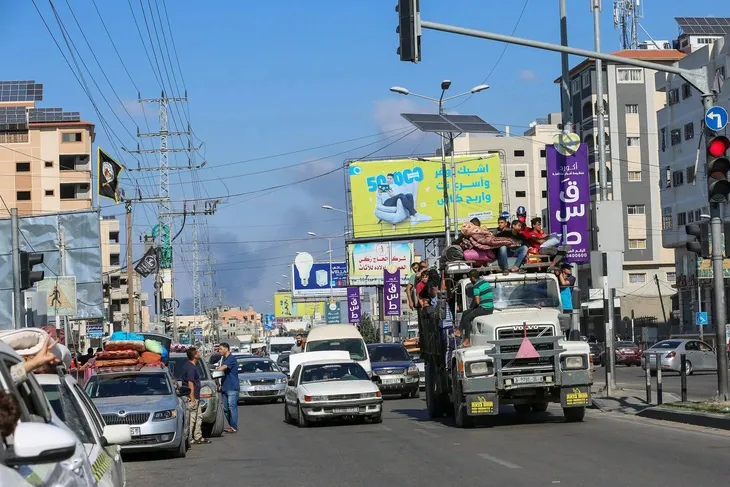 nguoi-palestine-di-tan-khoi-gaza-16973512314311925098601.webp