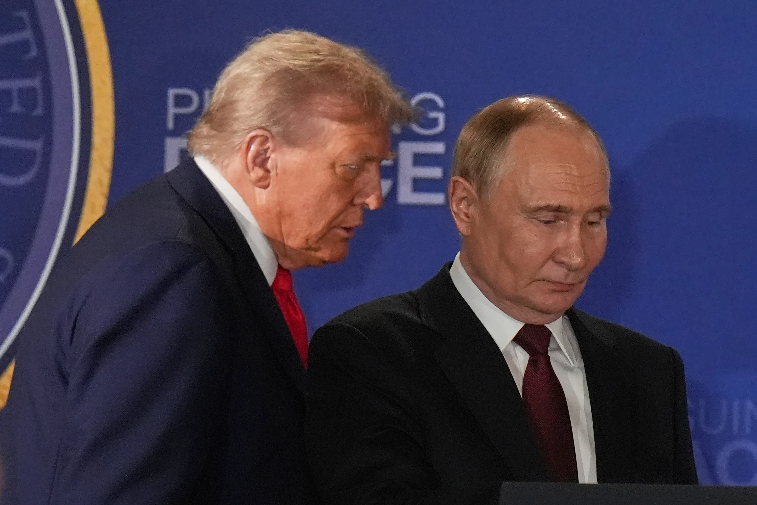 president-donald-trump-left-russias-109650108.jpg.webp